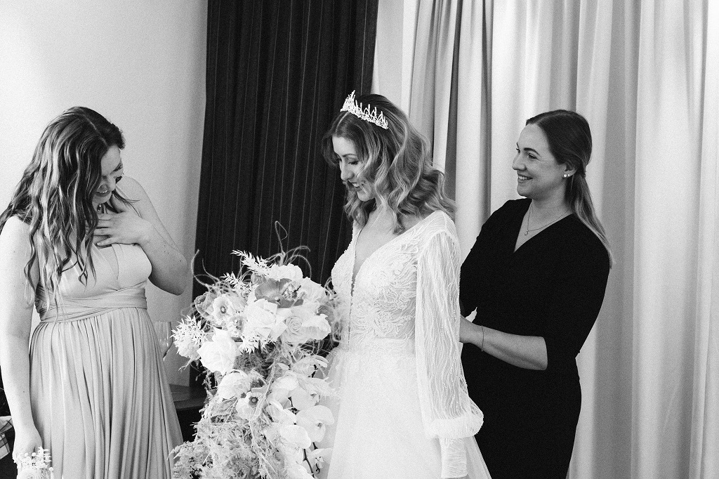 Master of ceremonies with bride and bridesmaid at Getting Ready