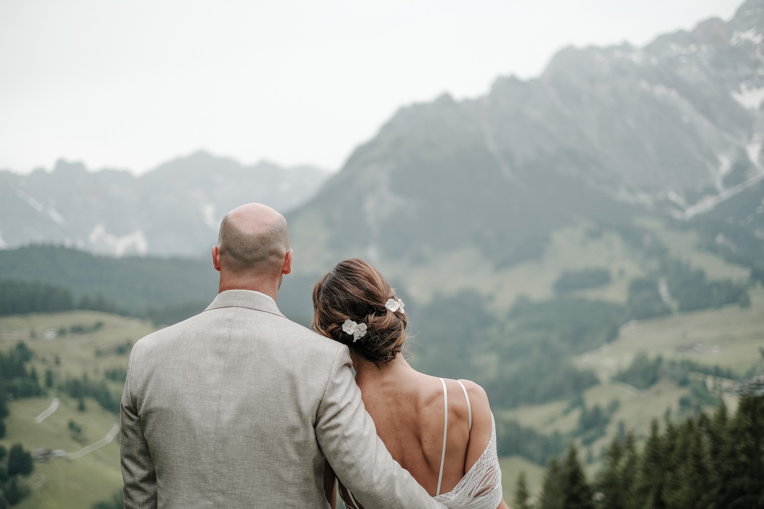 Bridal couple at their intimate wedding in the mountains in the Alps