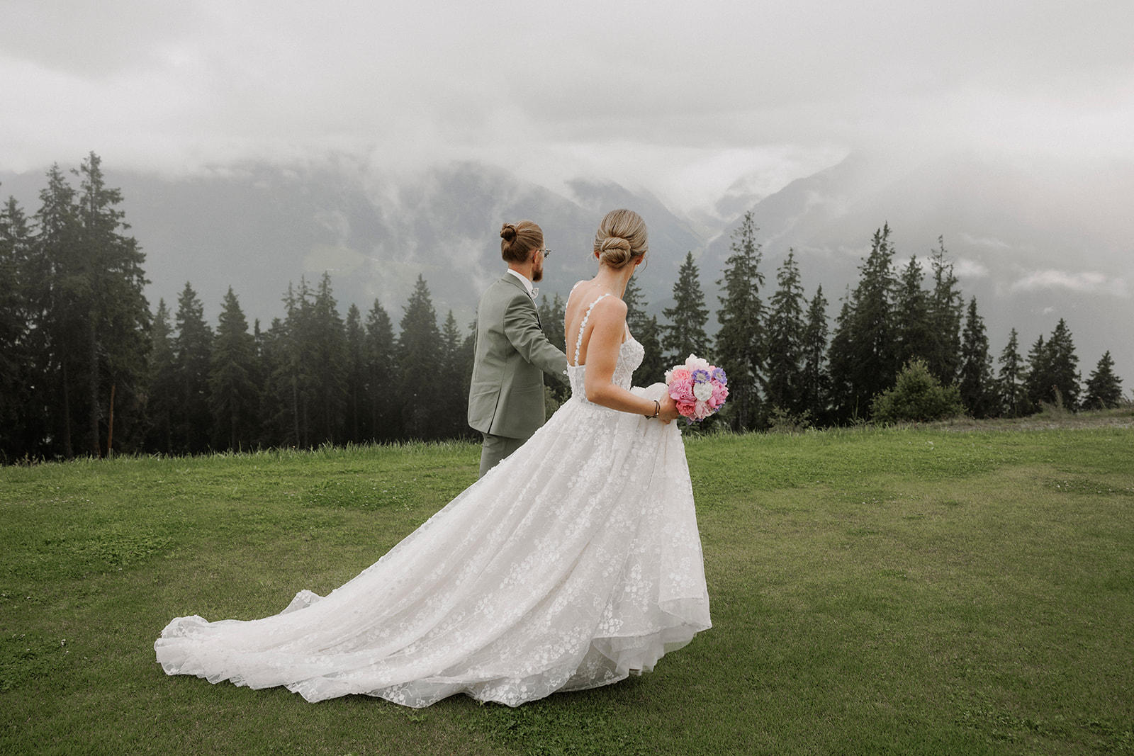 Bridal couple at their summer wedding at the ToniAlm in Kitzbühel in Austria